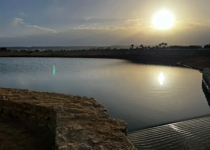 Nyaraló Cyan Lagoon-front Shared Pool & Evening Sunsets